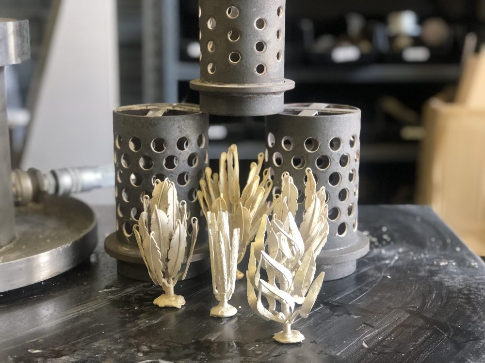 Cast trees and flasks, by Kenly Warren
