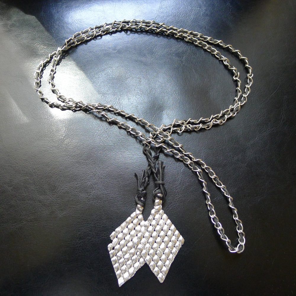 Diamond pendant necklace, by Kenly Warren